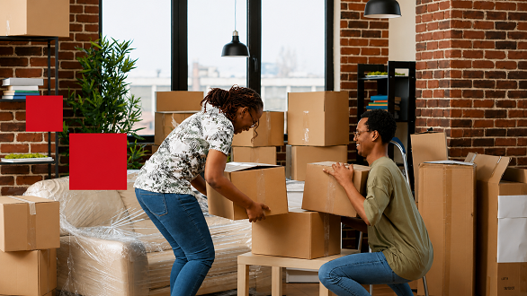 Professional removal team preparing household boxes during a home move in Cambridge